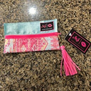 Women’s Makeup Junkie pink and blue bag. Never used.